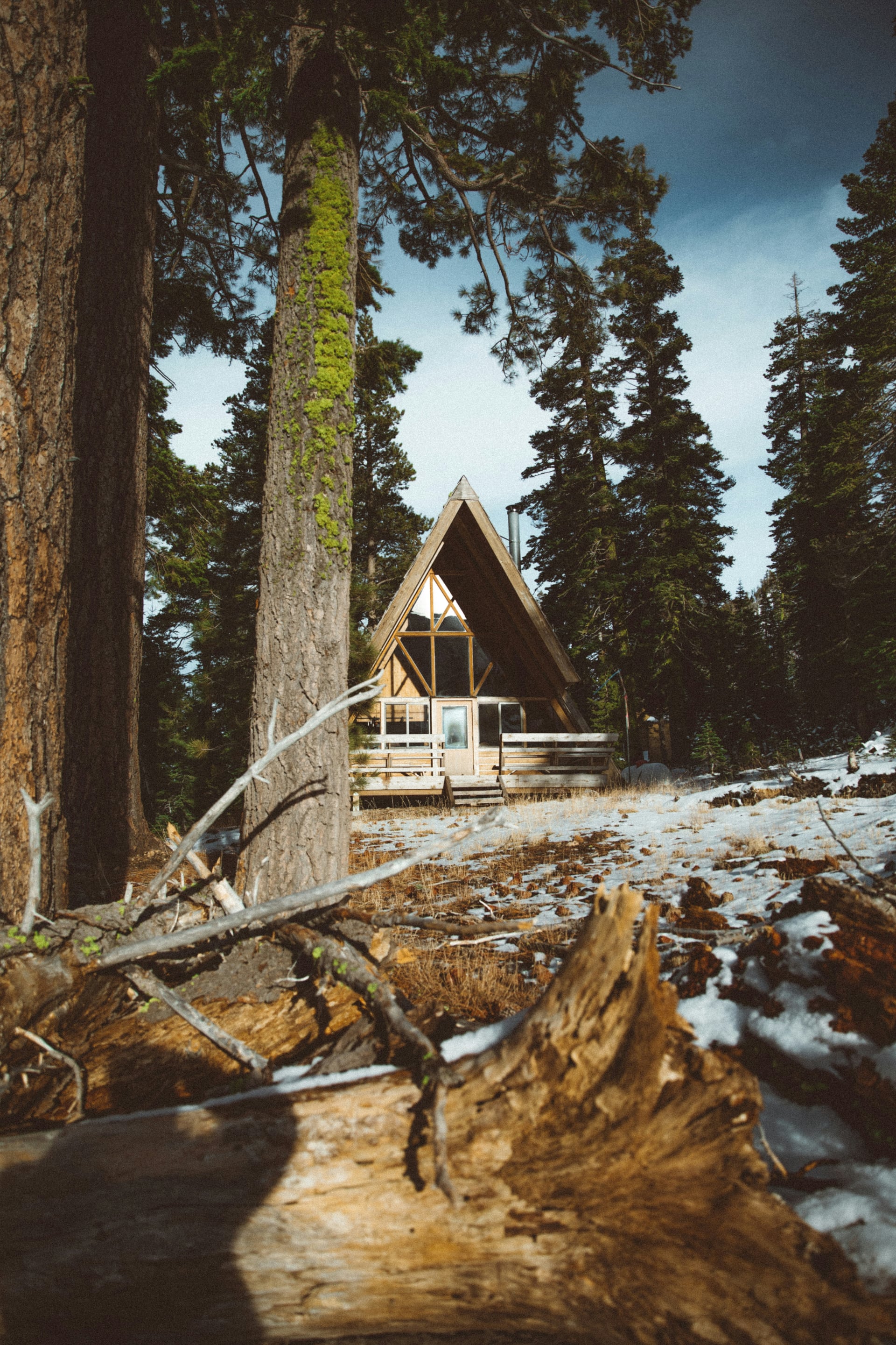 A-frame cabin glamping accommodation - triangular structure with steeply angled sides for glamping resort development